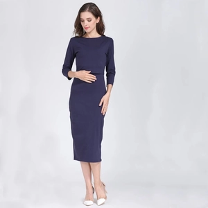 Detail of slim-fit navy blue maternity dress with functional nursing layers and 3/4 sleeves