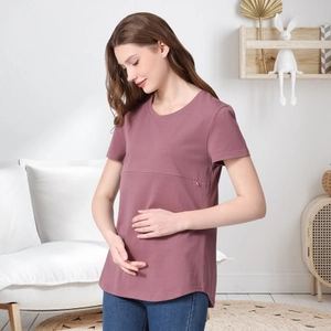 Detail of hidden horizontal nursing zipper on soft mauve cotton maternity t-shirt