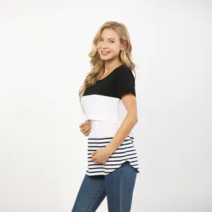 Detail of maternity nursing T-shirt with vertical patchwork stripes and curved hemline