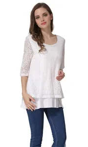 Detail of white floral lace maternity nursing top with layered hem and half sleeves