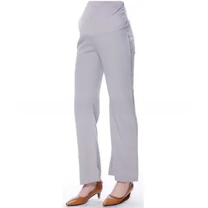 Detail of high waist maternity pants with stretch support in light grey cotton fabric