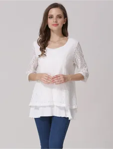Detail of white lace nursing top with layered chiffon hem and 3/4 sleeves design