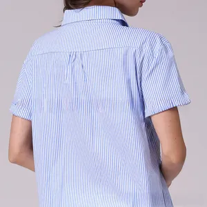 Detail of blue and white striped maternity shirt featuring a back pleat design for a loose fit