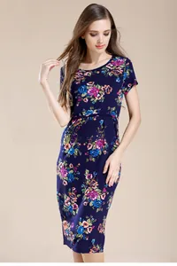 Close-up of floral print on dark blue modal nursing dress with pink flower detail