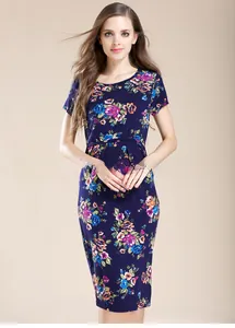 Detail of stretch knit floral maternity dress with vibrant large flower prints on navy blue