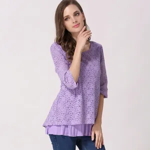 Detail of purple lace nursing top showing floral hollow-out texture and tiered design