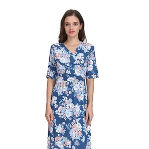 Detail of V-neck floral maternity dress in navy blue with nursing function and adjustable belt