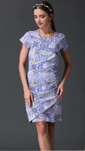 Detail of V-neck overlap neckline and geometric floral pattern on summer nursing dress
