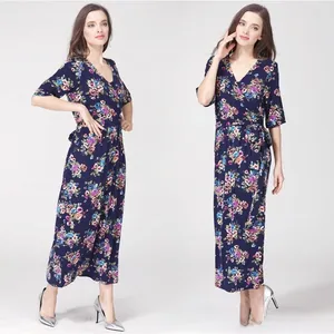Deep blue floral maternity maxi dress with V-neckline and adjustable waist detail