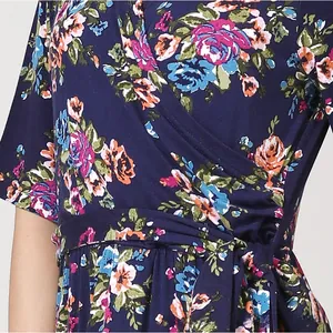 Detail of V-neck wrap floral maternity dress with adjustable waist and nursing access