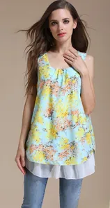 Detail of light blue floral chiffon maternity top with double-layered hemline design