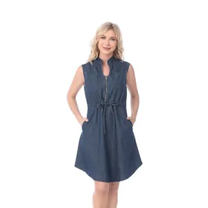 Detail of deep blue maternity denim dress with front zipper and adjustable waist drawstring
