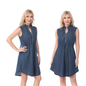 Detail of dark blue denim maternity dress with adjustable waist and front zipper