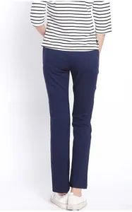 Rear view of navy maternity trousers with back pockets and high waist elastic belly band