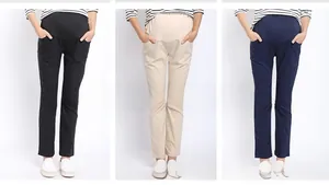 Close-up of maternity pants in black, beige, and navy with elastic high waist support band