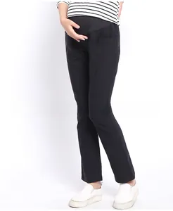 Close-up of maternity pants featuring an elastic high-waist belly support and casual straight fit