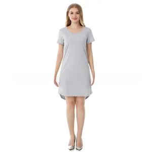 Close-up of maternity cotton breastfeeding dress with curved hem and short sleeves