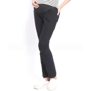 Detail of high waist maternity pants with elastic belly support in black casual style