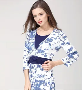 Detail of V-neck floral maternity dress showing nursing access and blue waist trim