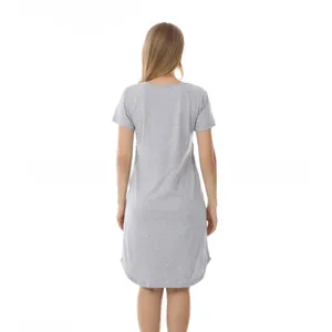 Rear view of grey cotton maternity nursing dress with curved hem and soft knit texture