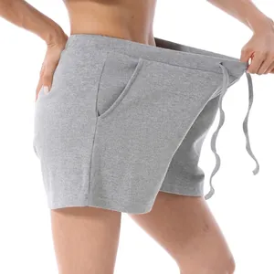 Grey waffle knit maternity shorts with high elastic drawstring waist and side pockets