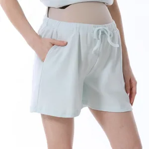 Light blue waffle knit high waist maternity shorts with drawstring and side pockets