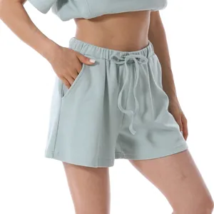 Women's mint green waffle knit shorts with elastic drawstring waist and side pockets