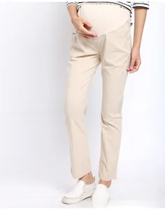 Front view of beige high-waist maternity pants with adjustable elastic belly support