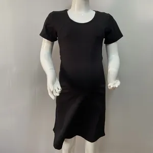 Detail of black maternity nursing dress featuring round neck and stretch cotton fabric