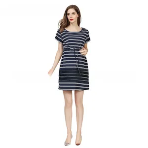 Detail of adjustable drawstring waist on a blue and white striped maternity dress