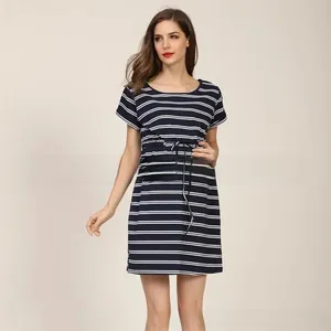 Close-up of drawstring waist and striped fabric texture on maternity dress