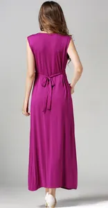 Back view of a long sleeveless modal nursing dress with high waist tie in fuchsia pink