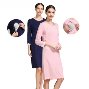 Close-up of invisible zipper nursing openings on modal maternity dress with lace cuffs