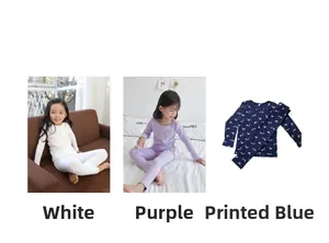 Detailed views of cotton kids' pajamas in solid white, purple, and blue floral prints