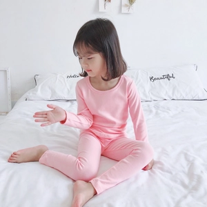 Pink thermal cotton loungewear set for girls featuring soft texture and cozy fit