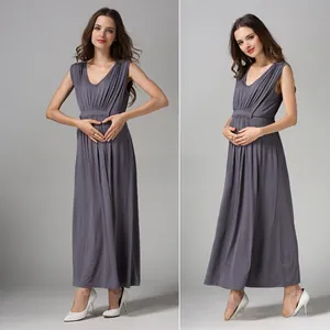 Detail view of dark grey modal maternity maxi dress with V-neck and high waist pleats