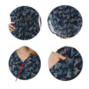Dettagli dell'abito premaman a fiori con scollo a V, coulisse in vita e tasche laterali