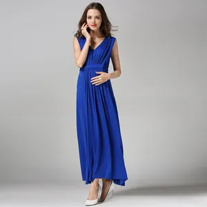 Detail of royal blue sleeveless maternity dress with V-neck and high waist pleats