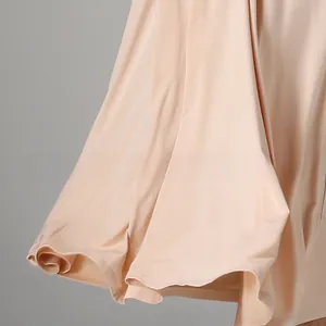 Close-up of soft modal fabric hem with dual-needle stitching on nursing dress