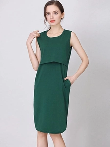 Minimalist dark green cotton maternity dress with nursing layer and side pockets