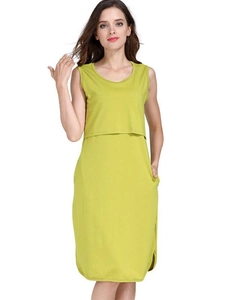 Sleeveless mustard green maternity nursing dress with a functional double-layer front
