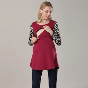 Detail of burgundy nursing top featuring leopard print sleeves and functional breastfeeding layer