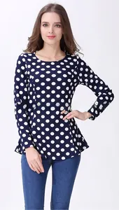 Detail of polka dot nursing top with round neck and side zipper for breastfeeding access