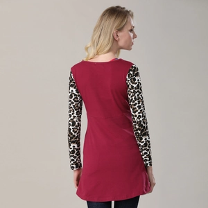 Detail of burgundy maternity top with leopard print sleeves and slim fit design