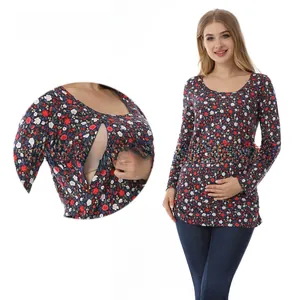 Detail of hidden breastfeeding opening on floral print long sleeve maternity top