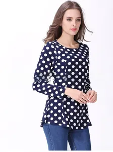 Close-up of navy polka dot maternity shirt with round neck and breastfeeding zipper