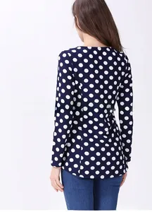 Rear view of long sleeve polka dot nursing shirt with concealed side feeding zippers