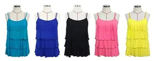 Detail view of colorful layered ruffle hem nursing camisoles on display mannequins