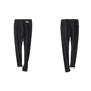 Fleece-lined maternity leggings in black with high waist support and pink inner lining