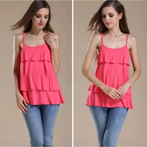 Detail of rose pink nursing camisole featuring layered ruffles and thin shoulder straps